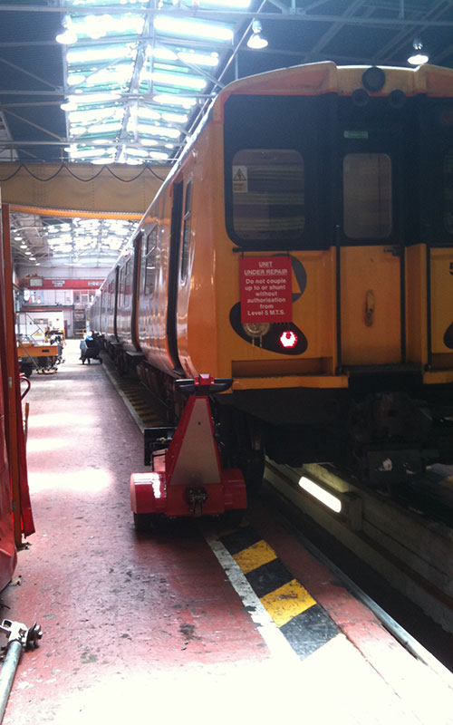 Dual Motor Super Power Pusher pushing railcars at MerseyRail
