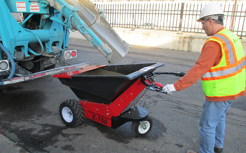 Using the MUV - Electric Wheelbarrow to transport concrete from roadside delivery lorry