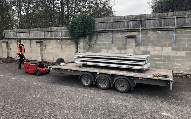 Towing triple axle Ifor Williams trailer loaded with concrete panels. Gross Weight 4,500Kg