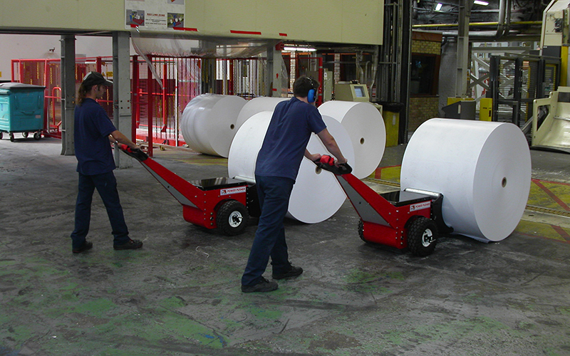 Power Pushers, with Roller Attachments, pushing paper reels at M-real