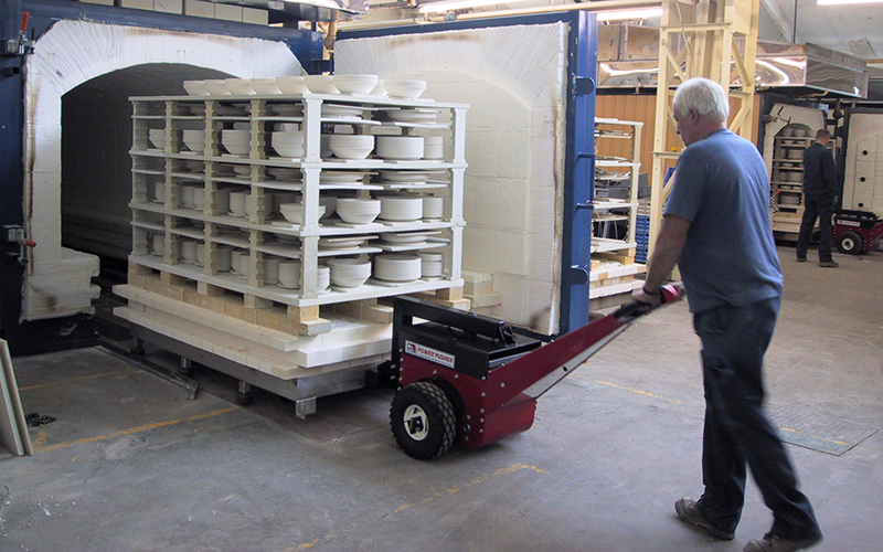Power Pusher with Steering Arm moving kiln trolleys into and out of Autoclaves for Churchill China plc
