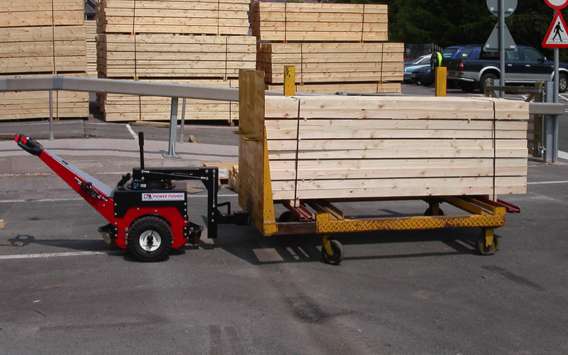 Power Pusher, with Steering Arm, moving 2,500Kg timber trolley in sawmill