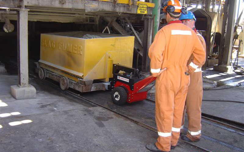 Power Pusher pulling/pushing slag trolley at Nyrstar Zinc processing plant, Port Pirie