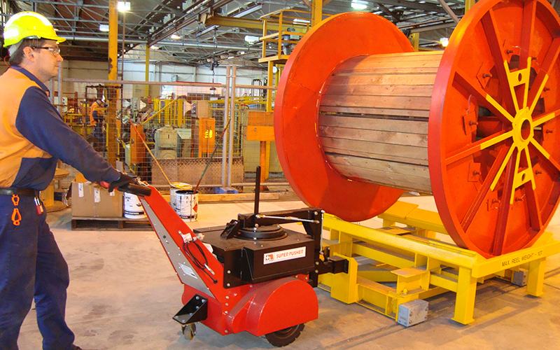 Super Power Pusher, with Steering Arm, moving 10,000Kg wire drum trolley at One Steel